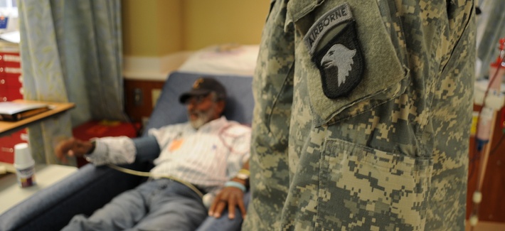 Capt. Trey Vaughn, chaplain in the 563rd Air Support Battalion, 159th Combat Aviation Brigade, visits with Johnny “Lawman” Wordlaw, a Vietnam veteran at the VA Hospital in Nashville, Tn., November 2012. Capt. Trey Vaughn, chaplain in the 563rd Air Support Battalion, 159th Combat Aviation Brigade, visits with Johnny “Lawman” Wordlaw, a Vietnam veteran at the VA Hospital in Nashville, Tn., November 2012.
