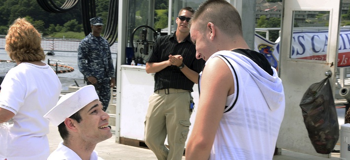 A sailor proposes to his boyfriend after returning from his deployment on the USS New Mexico A sailor proposes to his boyfriend after returning from his deployment on the USS New Mexico