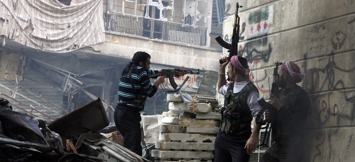 Fighters with the Free Syrian Army fire at government forces in Aleppo, Syria Fighters with the Free Syrian Army fire at government forces in Aleppo, Syria
