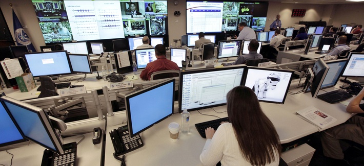 Analysts at the National Cybersecurity & Communications Integration Center prepare for an exercise Analysts at the National Cybersecurity & Communications Integration Center prepare for an exercise