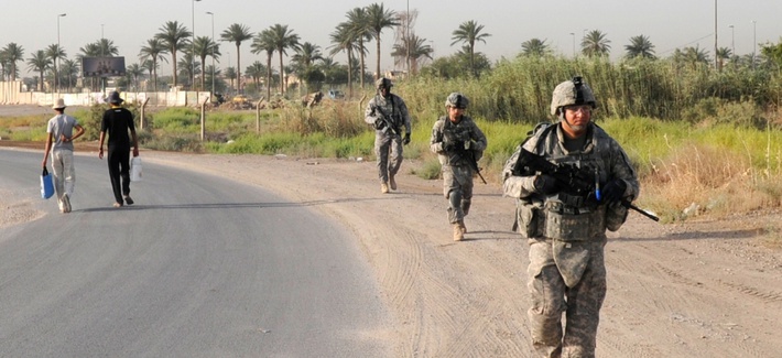 Troops with the 1st Battalion, 7th Field Artillery Regiment patrol in Iraq in 2011.