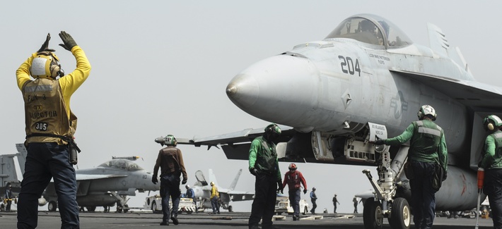 An F/A-18E Super Hornet prepares to launch from the flight deck of the aircraft carrier USS Nimitz in the Red Sea on Tuesday. An F/A-18E Super Hornet prepares to launch from the flight deck of the aircraft carrier USS Nimitz in the Red Sea on Tuesday.