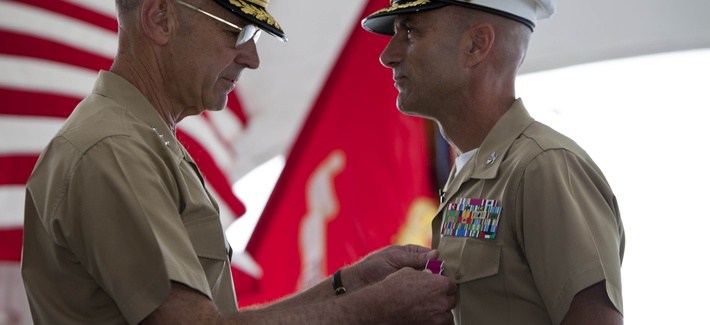Lt. Gen. Duane Thiessen, commander of U.S. Marine Corps Forces, Pacific, pins the Legion of Merit onto Col. Steve Manning, who retired after a 32-year career, in a ceremony aboard the U.S.S. Missouri Memorial, Ford Island, HI, Feb. 28, 2012. Lt. Gen. Duane Thiessen, commander of U.S. Marine Corps Forces, Pacific, pins the Legion of Merit onto Col. Steve Manning, who retired after a 32-year career, in a ceremony aboard the U.S.S. Missouri Memorial, Ford Island, HI, Feb. 28, 2012.
