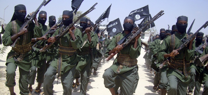 Al-Shabab fighters march during military exercises outside Mogadishu, Somalia, in 2011. Al-Shabab fighters march during military exercises outside Mogadishu, Somalia, in 2011.