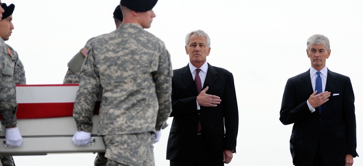 Defense Secretary Chuck Hagel and Army Secretary John McHugh at Dover AFB on Wednesday for the homecoming of four soldiers killed in Afghanistan this weekend. Defense Secretary Chuck Hagel and Army Secretary John McHugh at Dover AFB on Wednesday for the homecoming of four soldiers killed in Afghanistan this weekend.