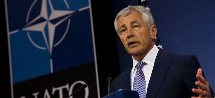 Defense Secretary Chuck Hagel briefs the press at a NATO meeting in Brussels in June. Defense Secretary Chuck Hagel briefs the press at a NATO meeting in Brussels in June.