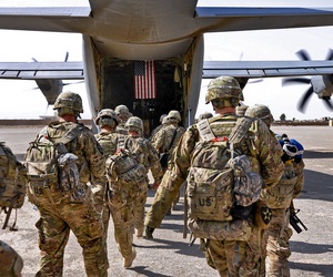 Soldiers board an Air Force C-130 bound for Joint Base Lewis-McChord Soldiers board an Air Force C-130 bound for Joint Base Lewis-McChord