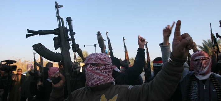 Gunmen in Fallujah, Iraq, chant slogans against the Iraqi government Gunmen in Fallujah, Iraq, chant slogans against the Iraqi government
