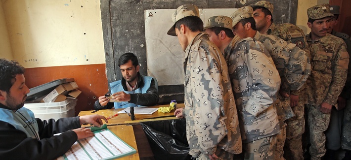 Afghan security forces cast their votes at a polling station in Kabul, Afghanistan, Saturday, April 5, 2014. Afghan security forces cast their votes at a polling station in Kabul, Afghanistan, Saturday, April 5, 2014.
