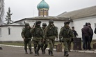 Pro-Russian troops marching in Crimea