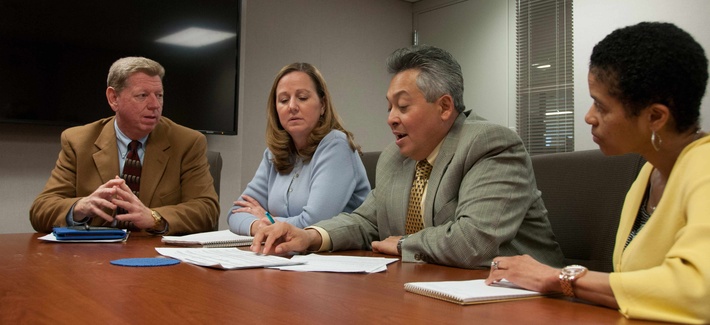 Civilian employees at Robins Air Force Base discussing manning and labor issues at a meeting Civilian employees at Robins Air Force Base discussing manning and labor issues at a meeting