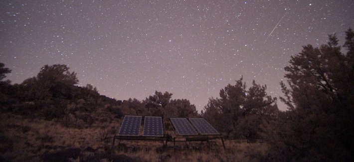A time lapse of solar panels during the night time A time lapse of solar panels during the night time