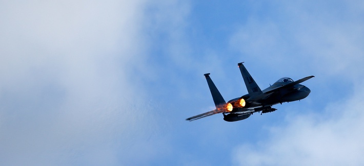 A U.S. F15C Eagle jet fighter flies over Lithuania for a NATO exercise at the Siauliai airbase, April 2, 2014. A U.S. F15C Eagle jet fighter flies over Lithuania for a NATO exercise at the Siauliai airbase, April 2, 2014.
