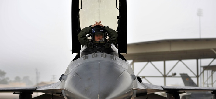 A U.S. Air Force Captain with the 55th Fighter Squadron prepares his cockpit in his F-16 prior to takeoff from Shaw Air Force Base, South Carolina A U.S. Air Force Captain with the 55th Fighter Squadron prepares his cockpit in his F-16 prior to takeoff from Shaw Air Force Base, South Carolina