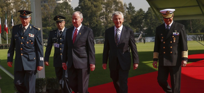 Defense Secretary Chuck Hagel with Canadian Defense Minister Rob Nicholson and Mexican Gen. Salvador Cienfuegos during a reception in Mexico City on Thursday. Defense Secretary Chuck Hagel with Canadian Defense Minister Rob Nicholson and Mexican Gen. Salvador Cienfuegos during a reception in Mexico City on Thursday.