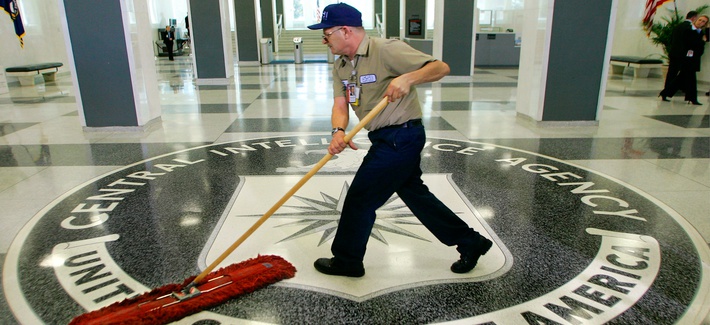 A workman slides a dust mop over the floor at the Central Intelligence Agency headquarters in Langley, Va., March 3, 2005. A workman slides a dust mop over the floor at the Central Intelligence Agency headquarters in Langley, Va., March 3, 2005.