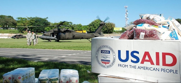 Two UH-60 helicopters prepare to pick up supplies en route to Ostuma, El Salvador, as part of a disaster relief effort after heavy rainstorms in the country Two UH-60 helicopters prepare to pick up supplies en route to Ostuma, El Salvador, as part of a disaster relief effort after heavy rainstorms in the country