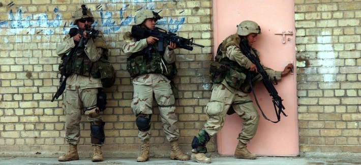 Soldiers from the 2nd Battalion, 5th Cavalry Regiment, 2nd Brigade Combat Team enter a building in Fallujah, Iraq, during Operation Al Fajr on Nov. 9, 2004. Soldiers from the 2nd Battalion, 5th Cavalry Regiment, 2nd Brigade Combat Team enter a building in Fallujah, Iraq, during Operation Al Fajr on Nov. 9, 2004.