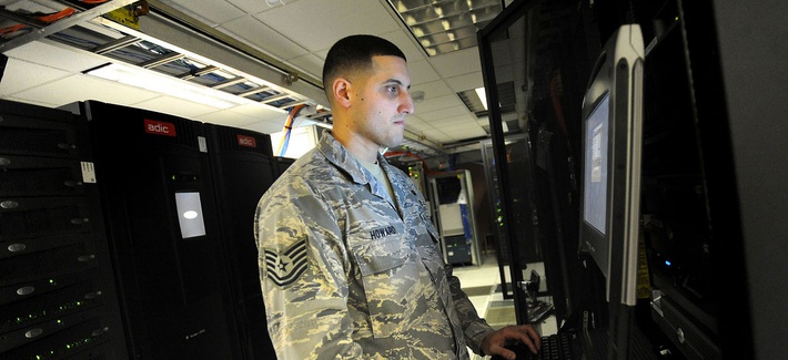 A non-commissioned officer with the 627th Communications Squadron works on a computer system at Joint Base Lewis-McChord in Washington A non-commissioned officer with the 627th Communications Squadron works on a computer system at Joint Base Lewis-McChord in Washington