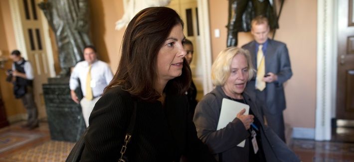 Sen. Kelly Ayotte, R-N.H, walks to a meeting with Senate Minority Leader Mitch McConnell, R-Ky., on October 14, 2013 Sen. Kelly Ayotte, R-N.H, walks to a meeting with Senate Minority Leader Mitch McConnell, R-Ky., on October 14, 2013