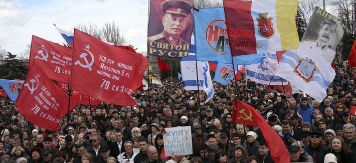 Protestors display Soviet-era flags and other posters during a demonstration in Odessa, Crimea. Protestors display Soviet-era flags and other posters during a demonstration in Odessa, Crimea.