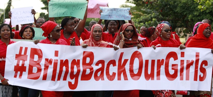 Women in Abuja, Nigeria, attend a demonstration to call on the Nigerian government to rescue the missing Chibok schoolgirls. Women in Abuja, Nigeria, attend a demonstration to call on the Nigerian government to rescue the missing Chibok schoolgirls.
