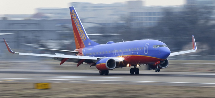 A Southwest Airlines jet lands at Love Field in Dallas, Feb. 3, 2014. A Southwest Airlines jet lands at Love Field in Dallas, Feb. 3, 2014.
