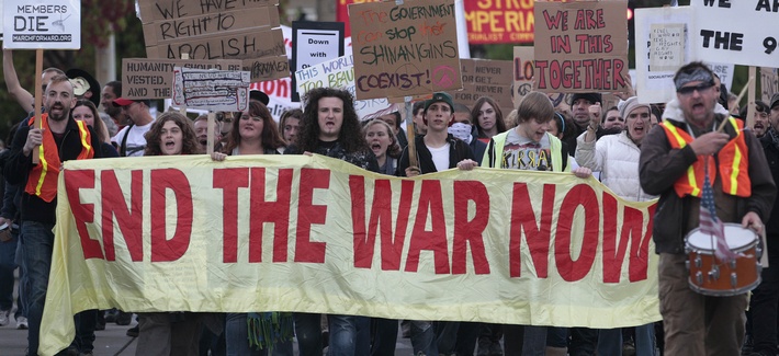 Several hundred demonstrators march in downtown Seattle to protest the war in Afghanistan in October 2011 ahead of the 10-year anniversary of the start of the war. Several hundred demonstrators march in downtown Seattle to protest the war in Afghanistan in October 2011 ahead of the 10-year anniversary of the start of the war.