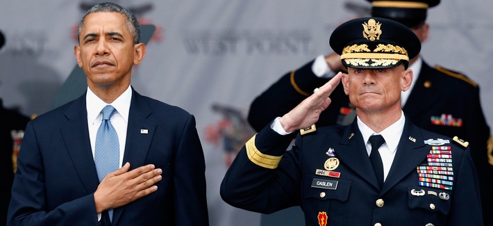 President Barack Obama and Lt. Gen. Robert Caslen Jr., superintendent at the U.S. Military Academy, stand for the national anthem during a graduation and commissioning ceremony at the academy, Wednesday, May 28, 2014, in West Point, N.Y. President Barack Obama and Lt. Gen. Robert Caslen Jr., superintendent at the U.S. Military Academy, stand for the national anthem during a graduation and commissioning ceremony at the academy, Wednesday, May 28, 2014, in West Point, N.Y.