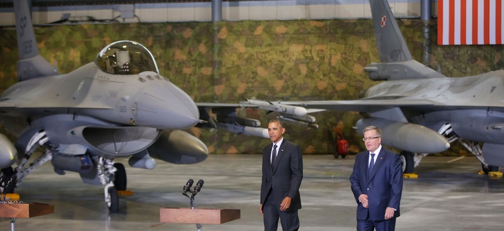President Obama walks towards the podium before a press conference with Polish President Bronislaw Komorowski on June 3, 2014. President Obama walks towards the podium before a press conference with Polish President Bronislaw Komorowski on June 3, 2014.
