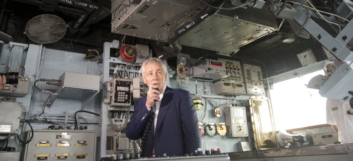 Defense Secretary Chuck Hagel uses the internal communications system of the USS Vella Gulf to address crew members on June 5, 2014. Defense Secretary Chuck Hagel uses the internal communications system of the USS Vella Gulf to address crew members on June 5, 2014.