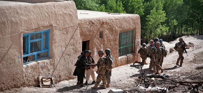 Paratroopers with the 82nd Airborne Division pull security outside a madrassa as Afghan soldiers search for weapons inside, on May 29, 2012. Paratroopers with the 82nd Airborne Division pull security outside a madrassa as Afghan soldiers search for weapons inside, on May 29, 2012.