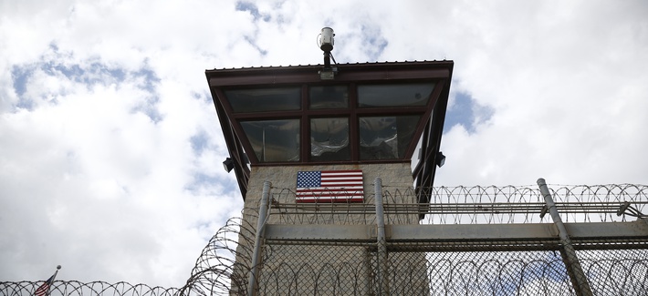 A photo of a guard tower at the entrance to the Camp VI facility at Guantanamo Bay Naval Base, taken on November 19, 2013. A photo of a guard tower at the entrance to the Camp VI facility at Guantanamo Bay Naval Base, taken on November 19, 2013.