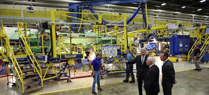 Former Defense Secretary Bob Gates inspects a F-35 Lightning II assembly line during a visit to a Lockheed Martin plant, on August 31, 2009. Former Defense Secretary Bob Gates inspects a F-35 Lightning II assembly line during a visit to a Lockheed Martin plant, on August 31, 2009.