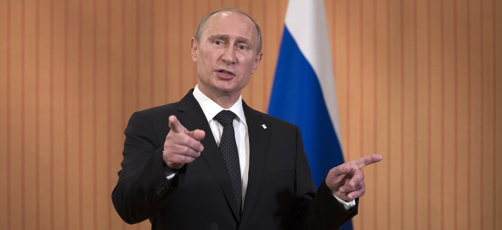 Russian President Vladimir Putin speaks to reporters at the 70th anniversary of the D-Day invasion in Normandy, on June 6, 2014. Russian President Vladimir Putin speaks to reporters at the 70th anniversary of the D-Day invasion in Normandy, on June 6, 2014.