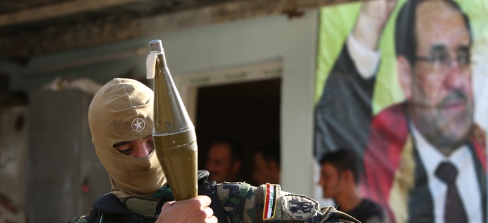 An Iraqi Shiite Turkmen gunman in the village of Taza Khormato, in the oil rich province of Kirkuk, Iraq, on June 20, 2014. An Iraqi Shiite Turkmen gunman in the village of Taza Khormato, in the oil rich province of Kirkuk, Iraq, on June 20, 2014.