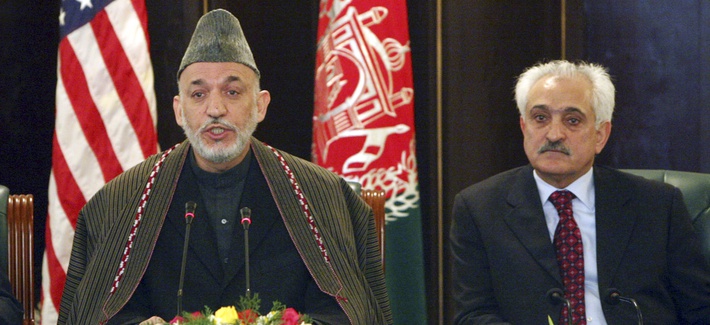 Afghan president Hamid Karzai and Rangin Dadfar Spanta listen during a press event at the presidential palace in Kabul, Afghanistan, on February 15, 2009. Afghan president Hamid Karzai and Rangin Dadfar Spanta listen during a press event at the presidential palace in Kabul, Afghanistan, on February 15, 2009.