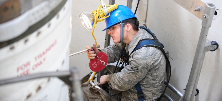 An airman at Minot Air Force Base inspects one of the components on a Minuteman III missile, on April 11, 2013. An airman at Minot Air Force Base inspects one of the components on a Minuteman III missile, on April 11, 2013.