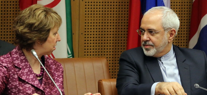 EU foreign policy chief Catherine Ashton and Iran's foreign minister Javad Zarif wait for the start of closed door negotiations in Vienna, Austria, on July 3, 2014. EU foreign policy chief Catherine Ashton and Iran's foreign minister Javad Zarif wait for the start of closed door negotiations in Vienna, Austria, on July 3, 2014.