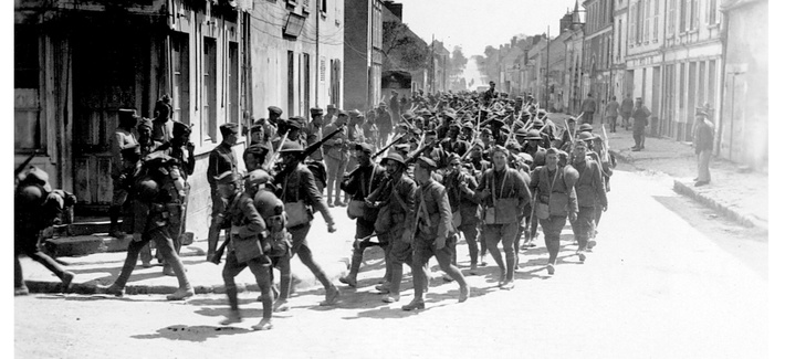 Soldiers with the 30th Infantry, 3rd Division, march through Viele Maisons, France, on June 2, 1918. Soldiers with the 30th Infantry, 3rd Division, march through Viele Maisons, France, on June 2, 1918.
