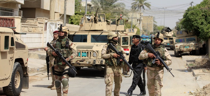 Iraqi Army soldiers patrol in Baghdad's Adhamiya district, on April 18, 2013. Iraqi Army soldiers patrol in Baghdad's Adhamiya district, on April 18, 2013.