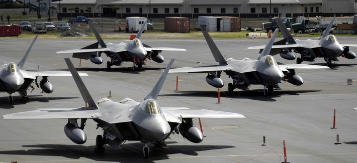F-22 Raptors with the 27th Fighter Squadron sit on the flightline at Hickam Air Force Base, Hawaii. F-22 Raptors with the 27th Fighter Squadron sit on the flightline at Hickam Air Force Base, Hawaii.