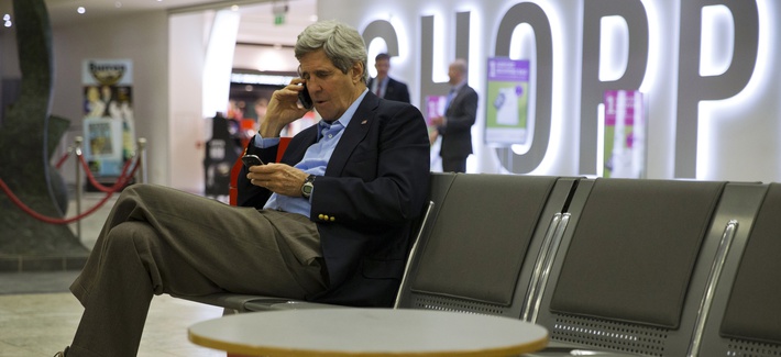 Secretary of State John Kerry speaks on his cell phone at Shannon Airport in Ireland on March 29, 2014. Secretary of State John Kerry speaks on his cell phone at Shannon Airport in Ireland on March 29, 2014.