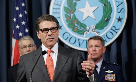 Gov. Rick Perry speaks during a news conference in the Governor's press room, July 21, 2014, in Austin, Texas. Gov. Perry announced he is deploying up to 1,000 National Guard troops over the next month to the Texas-Mexico border to combat criminals. Gov. Rick Perry speaks during a news conference in the Governor's press room, July 21, 2014, in Austin, Texas. Gov. Perry announced he is deploying up to 1,000 National Guard troops over the next month to the Texas-Mexico border to combat criminals.