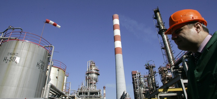 A worker at the NIS Jugopetrol oil refinery prior to a visit by Russian prime minister Dmitry Medvedev. A worker at the NIS Jugopetrol oil refinery prior to a visit by Russian prime minister Dmitry Medvedev.