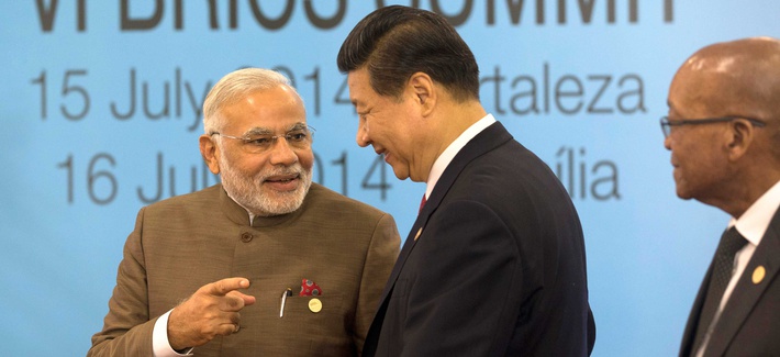 India's Prime Minister Narendra Modi meets with China's President Xi Jinping at a BRICS summit in Fortaleza, Brazil. India's Prime Minister Narendra Modi meets with China's President Xi Jinping at a BRICS summit in Fortaleza, Brazil.