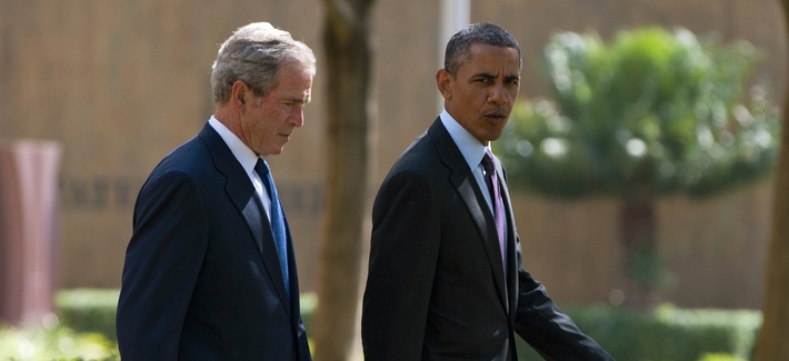 President Barack Obama, right, walks with former president George W. Bush during a wreath laying ceremony to honor the victims of the U.S. Embassy bombing on July 2, 2013, in Dar es Salaam, Tanzania. President Barack Obama, right, walks with former president George W. Bush during a wreath laying ceremony to honor the victims of the U.S. Embassy bombing on July 2, 2013, in Dar es Salaam, Tanzania.