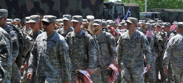 Soldiers from the Army's 3rd Infantry Regiment place flags at Arlington National Cemetary prior to Memorial Day weekend. Soldiers from the Army's 3rd Infantry Regiment place flags at Arlington National Cemetary prior to Memorial Day weekend.