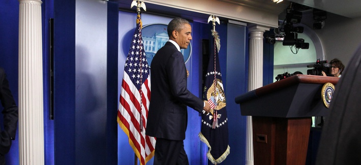 President Obama arrives to speak to reporters in the Brady Press Briefing Room, on August 1, 2014. President Obama arrives to speak to reporters in the Brady Press Briefing Room, on August 1, 2014.