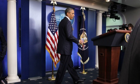 President Obama arrives to speak to reporters in the Brady Press Briefing Room, on August 1, 2014. President Obama arrives to speak to reporters in the Brady Press Briefing Room, on August 1, 2014.